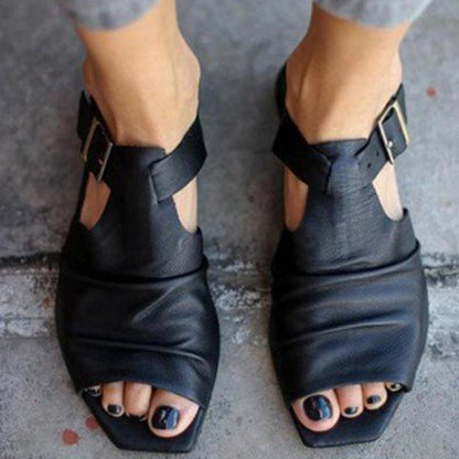 Hollow Roman sandals with a buckle