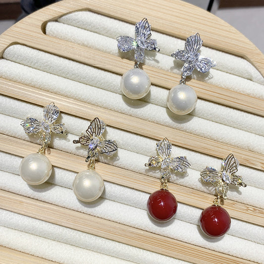 Gentle And Versatile Pearl Earrings With Diamond-Encrusted Butterfly Pendants
