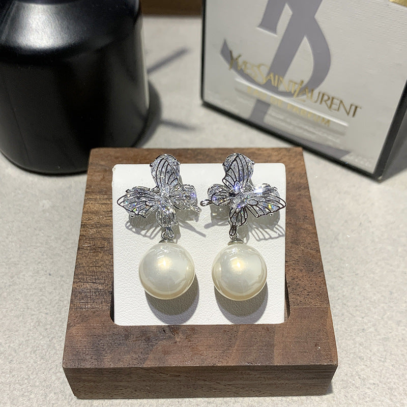 Gentle And Versatile Pearl Earrings With Diamond-Encrusted Butterfly Pendants