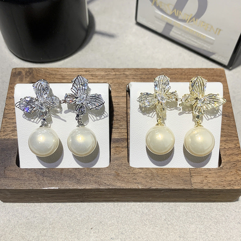 Gentle And Versatile Pearl Earrings With Diamond-Encrusted Butterfly Pendants