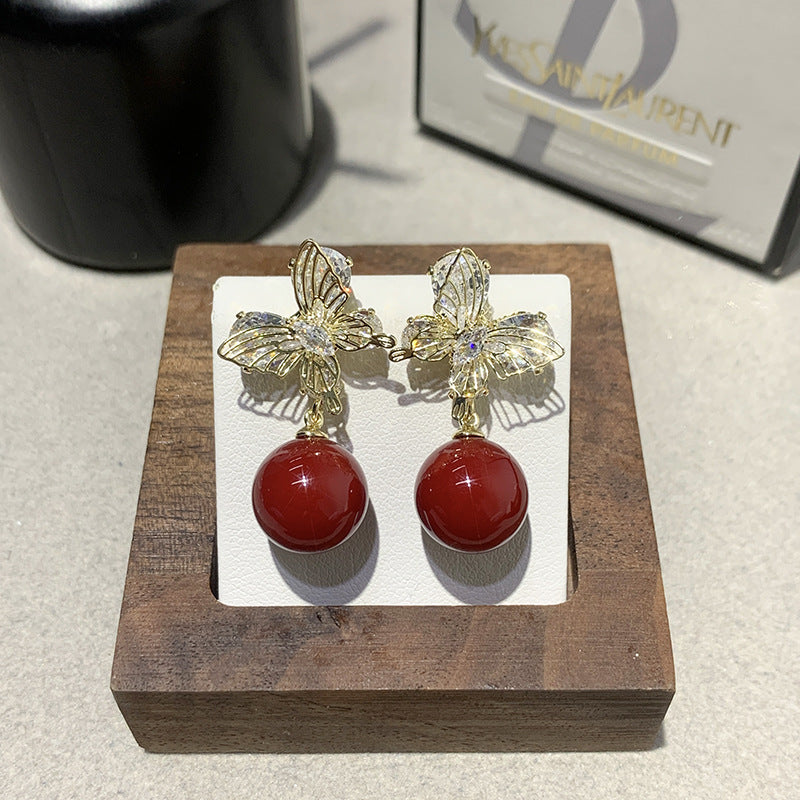 Gentle And Versatile Pearl Earrings With Diamond-Encrusted Butterfly Pendants