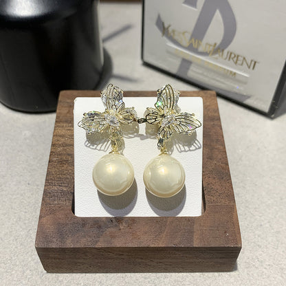 Gentle And Versatile Pearl Earrings With Diamond-Encrusted Butterfly Pendants